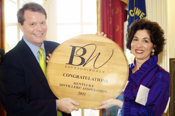 At the opening event of Bourbon Women at the Kentucky Governor's Mansion, ladies from throughout the country mingle and enjoy one another's company. The organization was started by Peggie Noe Stevens, who was the first female master taster in the spirits industry.